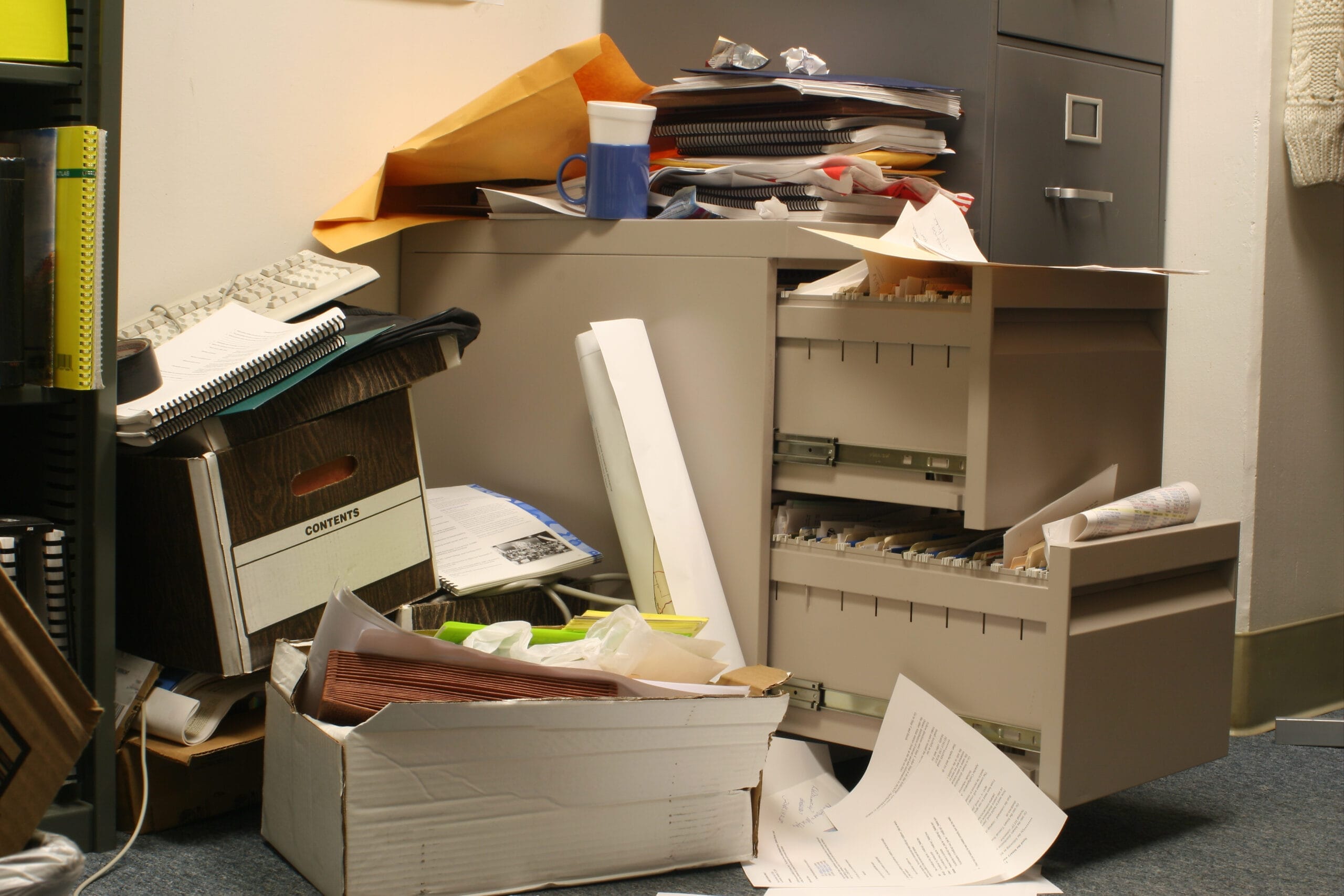 Broken filing cabinet and office junk from an office clearance